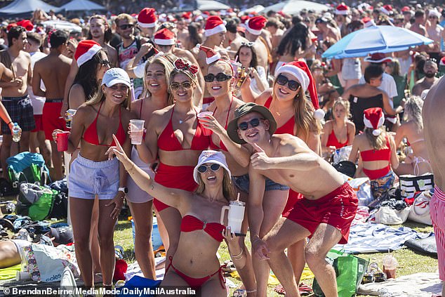 Spirits were high among visitors at Bronte Beach, although it is unclear how many stayed behind to help with the clean-up