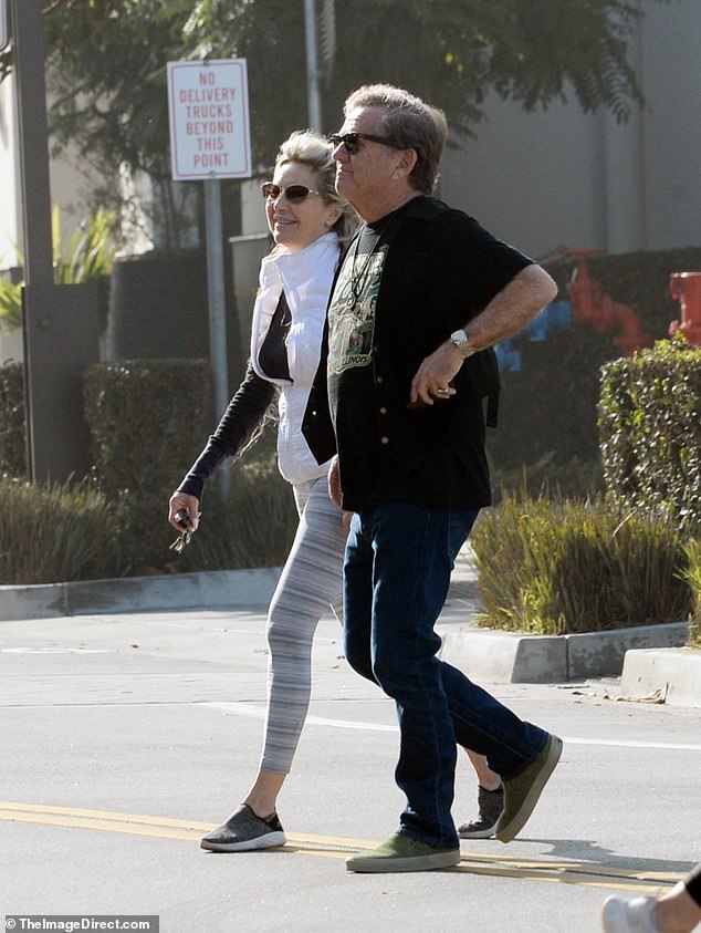 The actor, who is rarely seen in public, was pictured with a female companion while doing some last-minute Christmas shopping in Los Angeles on Monday.