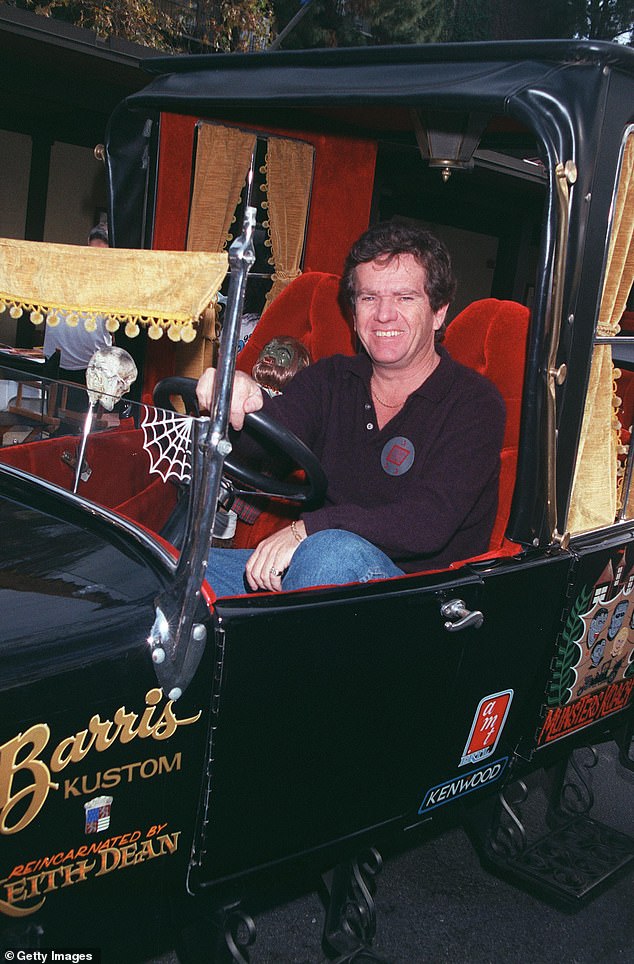 Patrick poses with the Munster Mobile at the Hollywood Collectors and Celebrity Show held at the Beverly Garland Holiday Inn in North Hollywood, California in 2001