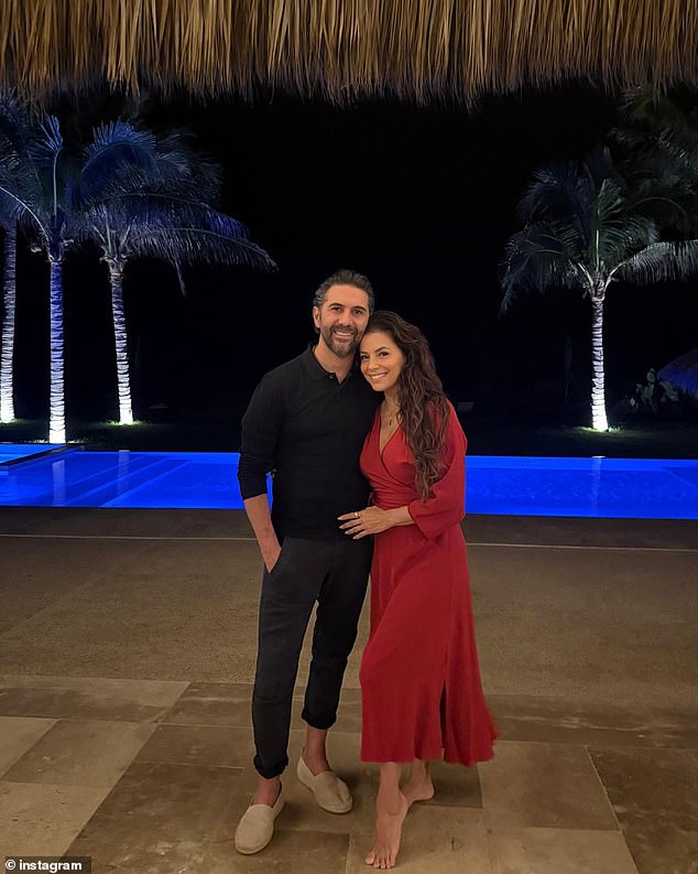 In one of the other photos, Eva cuddled with her handsome husband by the pool as she donned a red midi dress as her dark locks flowed down her shoulders