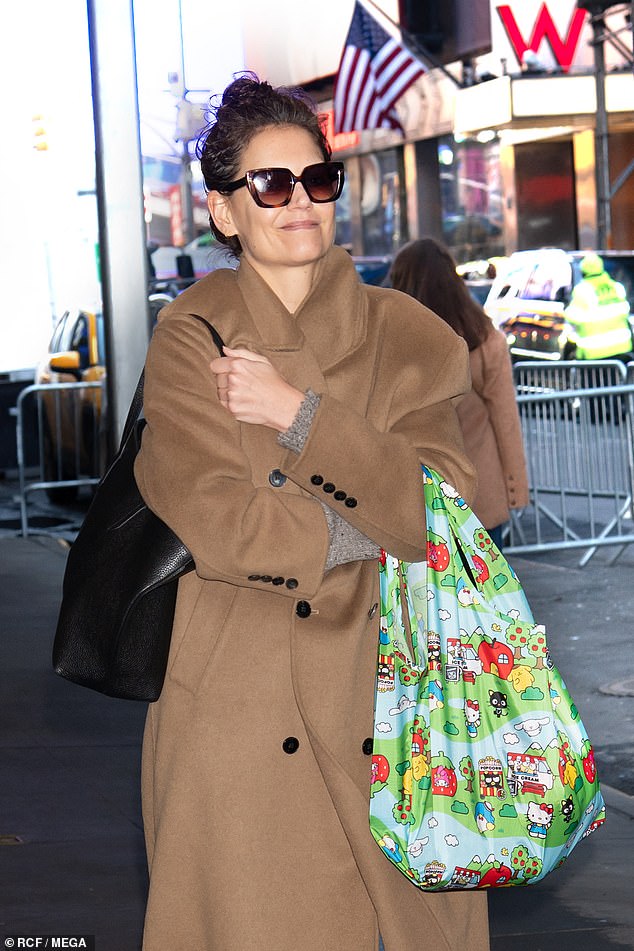 The 46-year-old Dawson's Creek alum made her way to the historic Barrymore Theater in New York City wearing a brown trench coat