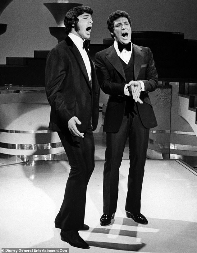 Capri became famous when he began touring in 1973 with singer Engelbert Humperdinck as a comedy attraction; Humperdinck and Tom Jones seen above in 1969