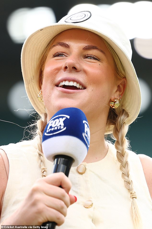 Brooke wore her flaxen locks in tight pigtails that fell over her shoulders. She completed her outfit with a bucket hat featuring the Shane Warne Legacy logo