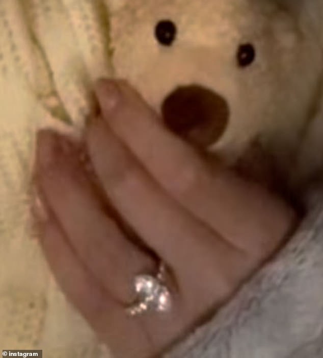 Gomez's engagement ring was clearly visible as she held an adorable stuffed bear in her left hand