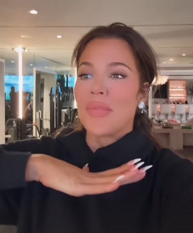 The Keeping Up with the Kardashians star kept more than 305 million followers updated on her holiday activities as she worked out in a black hoodie