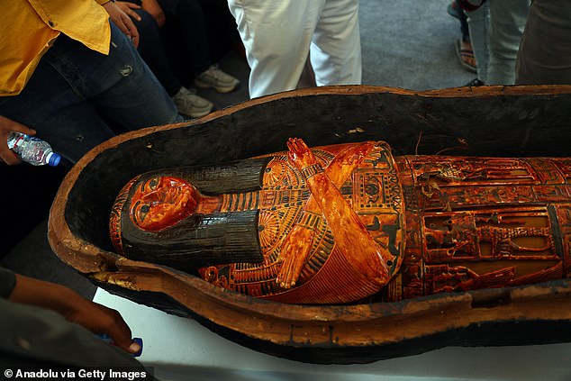 Above, a close-up of one of the New Kingdom mummies discovered last year, on October 15, 2023, in the Tuna el Gebel district of Minya, Egypt