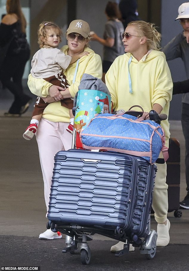 The pair looked more like sisters than a couple in love, wearing almost identical outfits