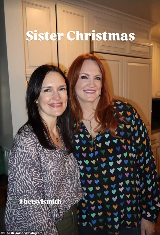 On Wednesday, the flame-haired foodie – who has 13.6 million social media followers – made merry with her younger sister Betsy Smith, captioning the snap: 'Sister Christmas'