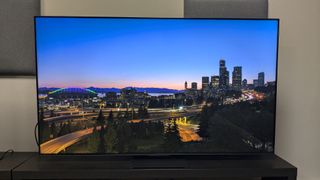 TCL C855 with twilight landscape on screen