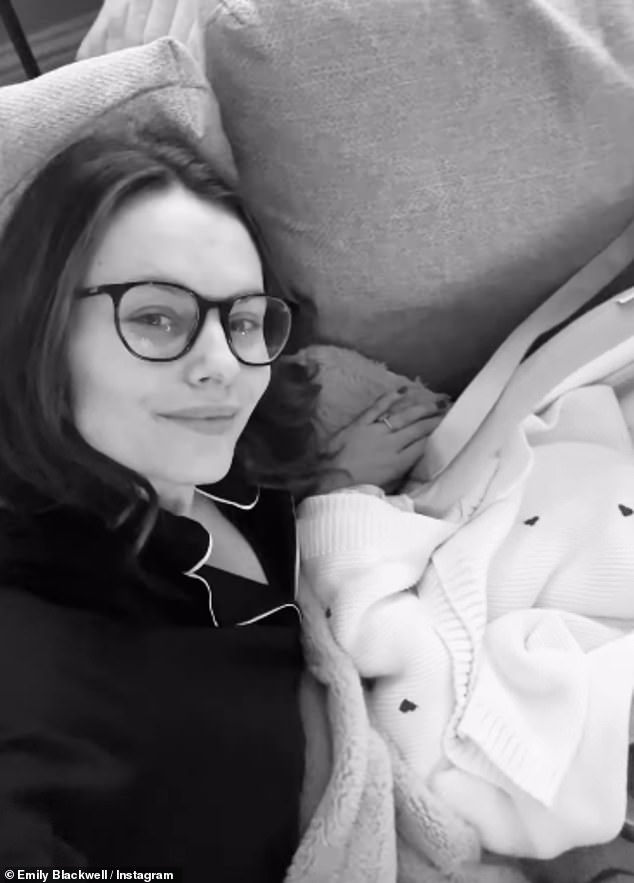 Emily beamed as she snuggled with baby Eva after they got home