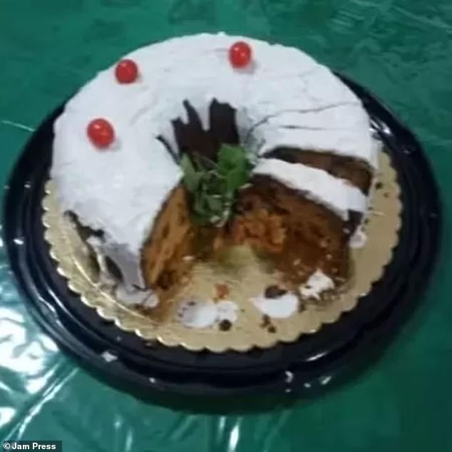 The Christmas cake, pictured, was eaten by the three women before they died