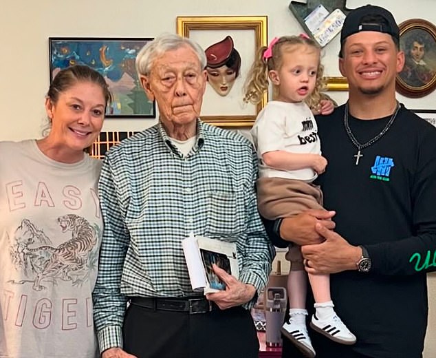 Randy Mahomes pictured next to his daughter Randi and his grandson Patrick