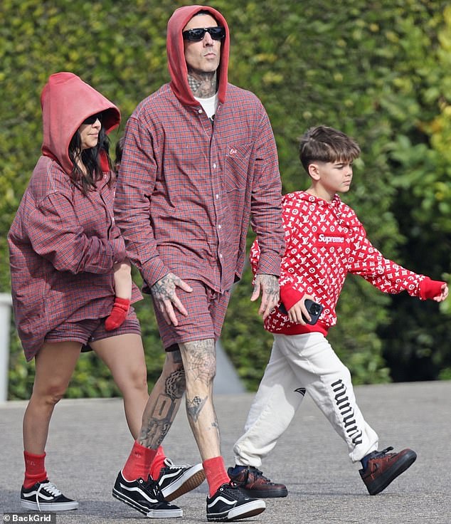 A few days after Christmas, the couple kept the festive spirit alive in matching sets of red clothes