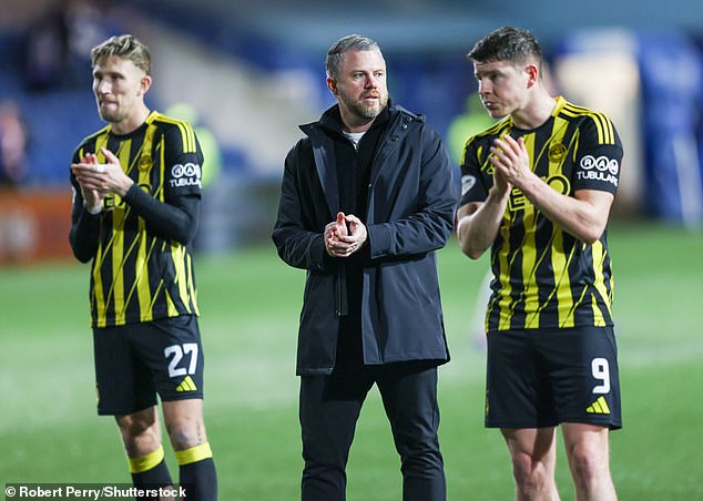 Thelin and his Dons players appear shell-shocked after the 4-0 defeat at Kilmarnock