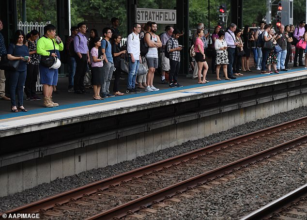 Sydney's rail network will run non-stop from 4am on December 31 to 2am on January 2 to accommodate huge crowds (photo: commuters in Strathfield in the city's west)