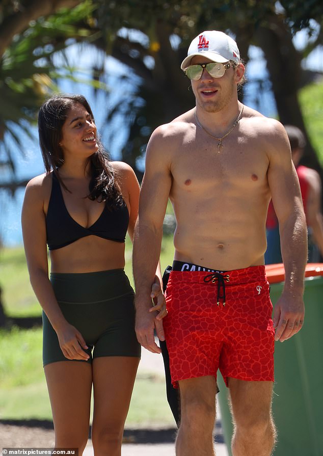 The reality star completed his summer look with aviator sunglasses and a white LA Dodgers baseball cap that hid his long locks.