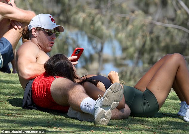 Jayden was seen lying on the floor, with his mystery wife also lying on his lap