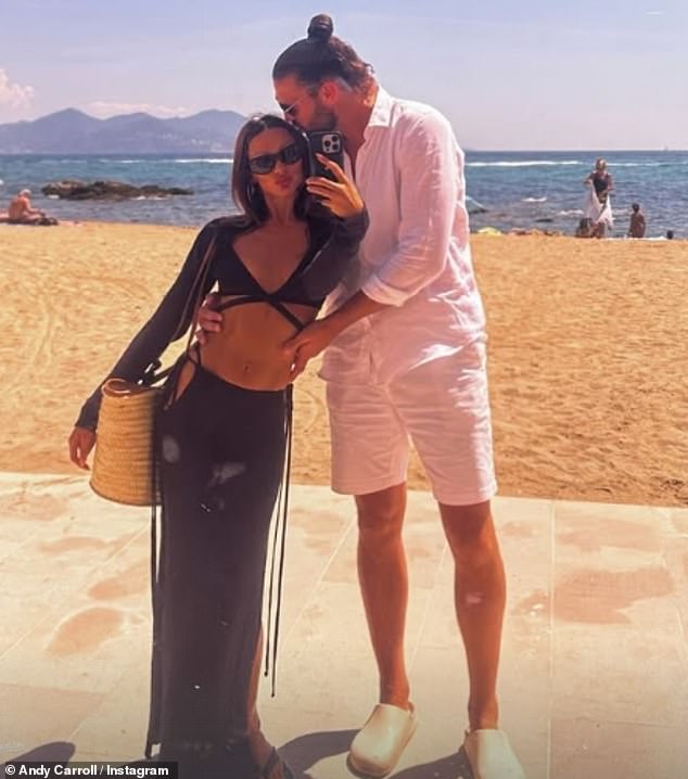 The festive photo comes days after Andy posted a kiss to his bikini-clad new girlfriend as they enjoyed a romantic beach holiday