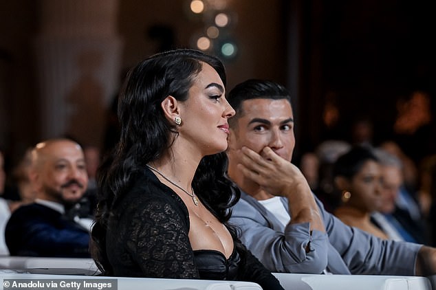 Ronaldo couldn't take his eyes off the 30-year-old as she stunned in a stunning black dress