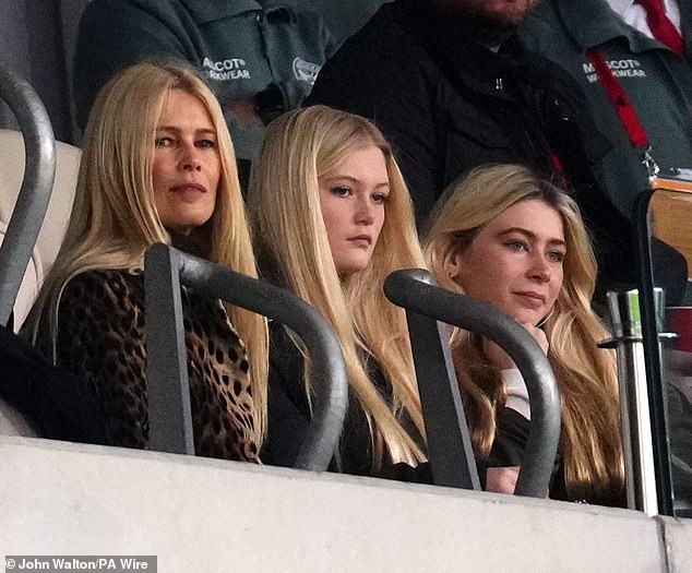 Claudia watches the Premier League match between Brentford and Nottingham Forest in the stands with her daughter at the Gtech Community Stadium, London on December 21