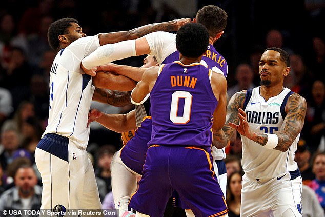 Phoenix center Jusuf Nurkic and Dallas forwards Naji Marshall and PJ Washington left the game