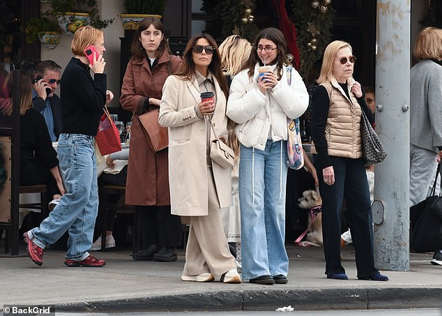 The Desperate Housewives alum, 49, paired a stylish beige co-ord with her ensemble as she and her 21-year-old stepdaughter enjoyed a quick coffee break