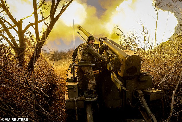 A soldier from the 24th Mechanized Brigade, named after King Danylo of the Ukrainian Armed Forces, fires a 2s5 "Hyacinth-s" self-propelled howitzer towards Russian troops in a front line