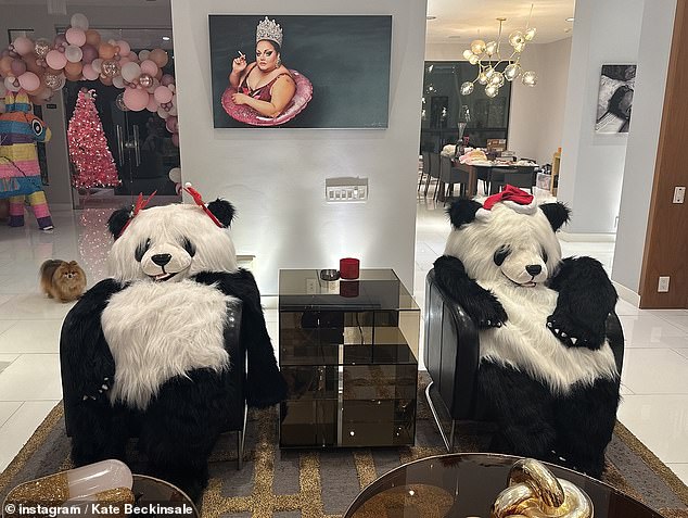 She also shared a photo of two giant panda cuddly toys wearing Santa hats and sitting on her furniture