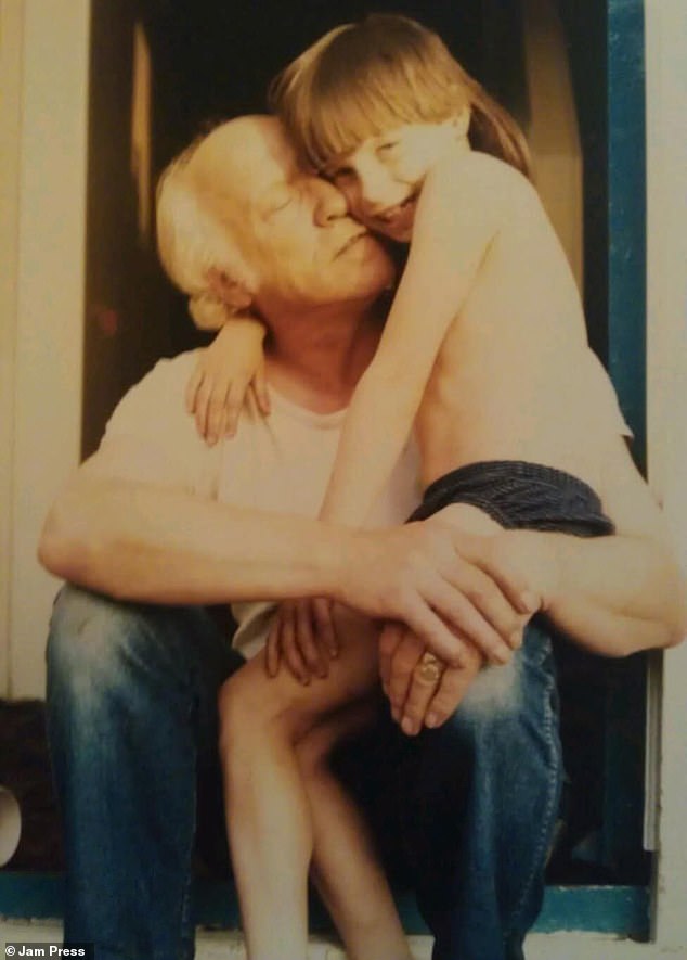 Katie with her father Arthur when she was a child. She found her father's photo while looking at his old house on Google Maps, using the site's historic Street View images