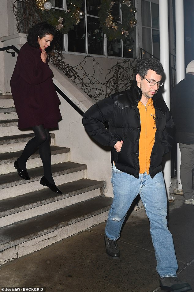 Margaret, 30, descended the steps of a brownstone in a burgundy wool knee-length coat that she kept tight around her neck amid the chilly weather