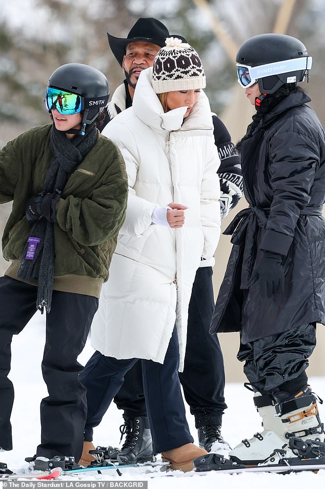 The hitmaker, 55, stepped out in a bright white puffy coat over dark ski pants. The Atlas star wore a white and black beanie over her long, blonde locks and thick-soled sheepskin boots on her feet