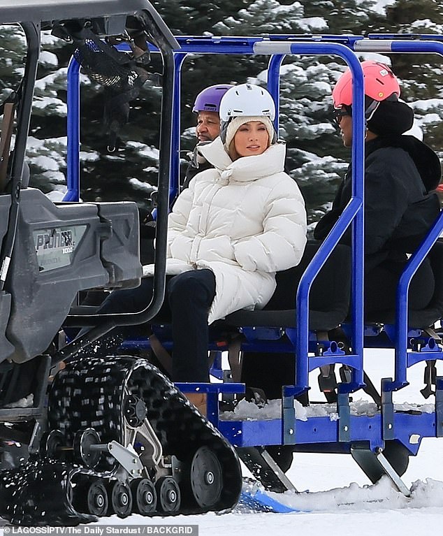 She and her group were spotted driving up the mountain in a purple tractor-like vehicle