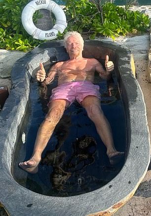 Chilling: Richard Branson takes a dip on Necker Island