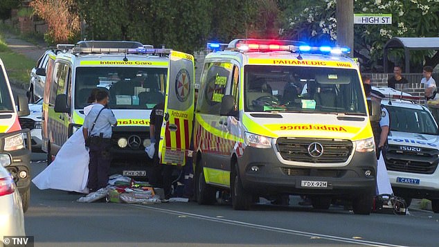 Paramedics (pictured) treated the man, believed to be in his 30s, for gunshot wounds at the scene, but he could not be revived