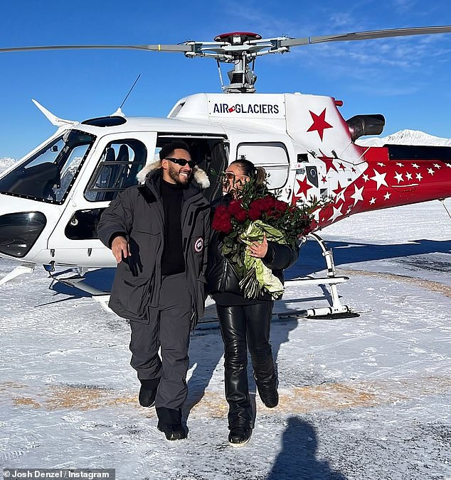 Ruby clutched a huge bouquet of flowers as they walked out of the helicopter, beaming into each other's eyes