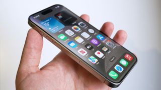 iPhone 15 Pro review handheld with slanted front