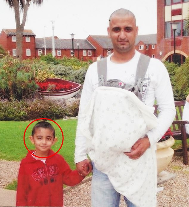 Sukhjeet Singh with his son Arjun in India in 2024. Now 17, he has asked MailOnline to use only childhood photos of him for this article so he can rebuild his life.