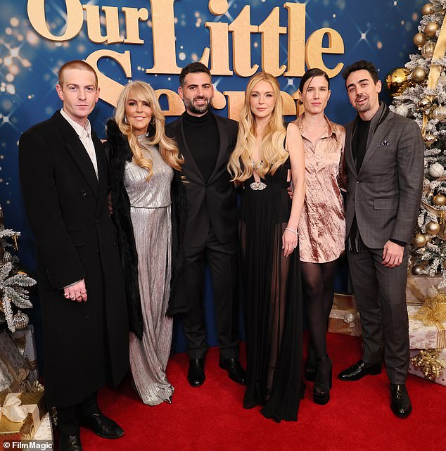 (L-R) Dakota Lohan, Dina Lohan, Bader Shammas, Lindsay Lohan, Nina Ginsberg, Michael Lohan Jr., attend the screening of Netflix's Our Little Secret at The Paris Theater in November in New York City