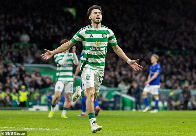 Winger Nicolas Kuhn celebrates scoring the opener in a one-sided encounter at Celtic Park