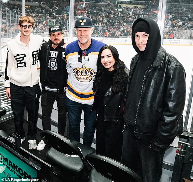 She attended the game with her fiancé Jutes and her boyfriend Dave Osokow and sat next to Will Ferrell 57, and his son Magnus right behind the glass