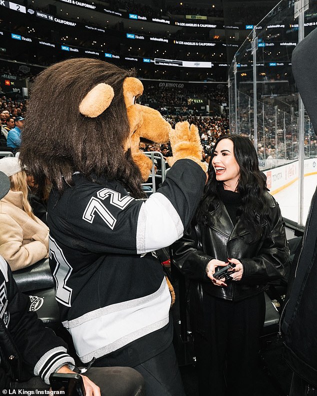 Kings mascot Bailey impressed Demi by hugging her, posing for photos with her and calling Demi his No. 1 fan in a later Instagram post