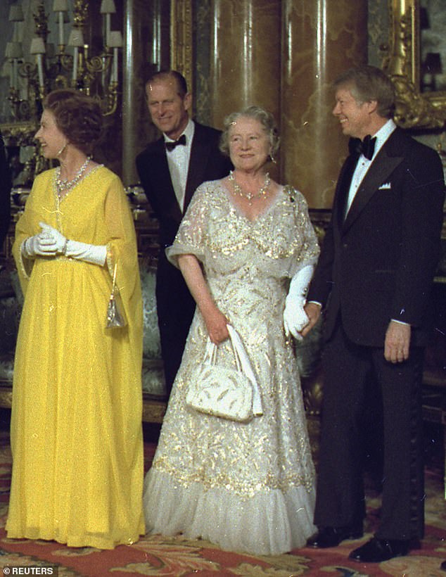 President Carter, right, can be seen holding the Queen Mother's gloved left hand. Queen Elizabeth II is seen on the far left in a yellow dress