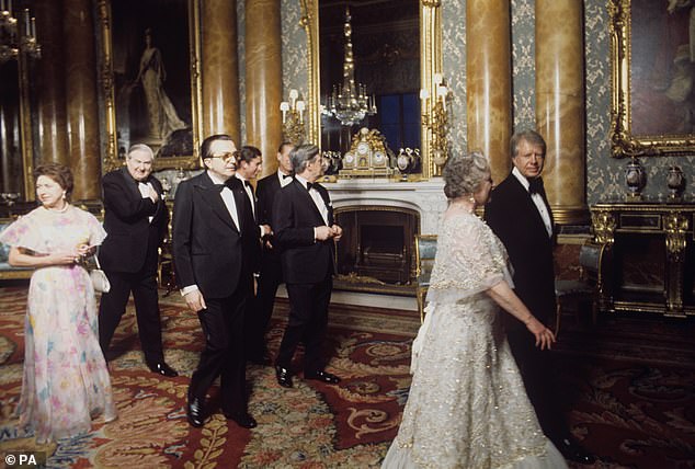 Carter appeared to glance at the Queen Mother during his brief visit to the palace