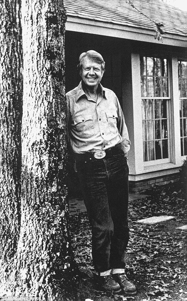 In this February 8, 1976 photo, Carter is seen relaxing in jeans outside his home in Plains, Georgia, the town where he met his soulmate Rosalynn.