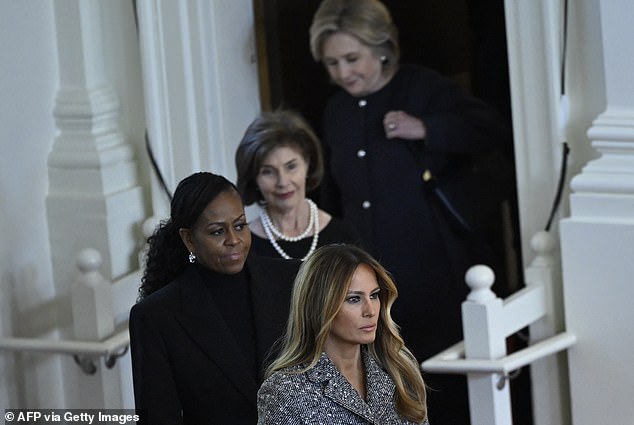 Former US Secretary of State Hillary Clinton, former US First Lady Laura Bush, former US First Lady Michelle Obama and former US First Lady Melania Trump arrive for a tribute to former US First Lady Rosalynn Carter