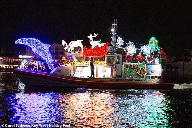 Pictured: Key West's annual boat parade, where a panel of judges votes on the best decorated ships