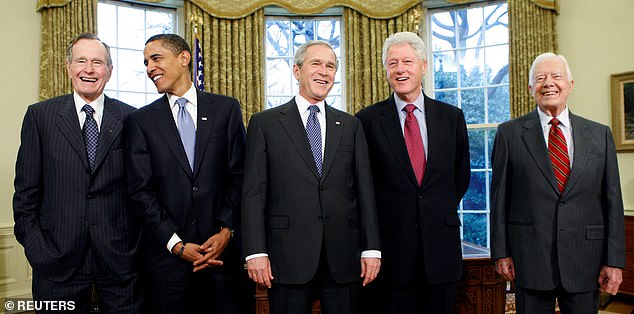 Former Presidents George H.W. Bush, Barack Obama, George W. Bush, Clinton and Carter pictured in the Oval Office in 2009