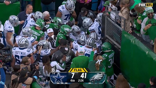 Several players eventually intervened at the tunnel as Sunday's match ended in chaos