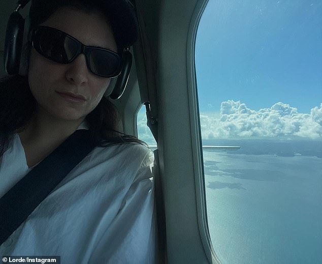 The second image showed Lorde riding in a helicopter, again in the sunshine, with a beautiful view outside the window