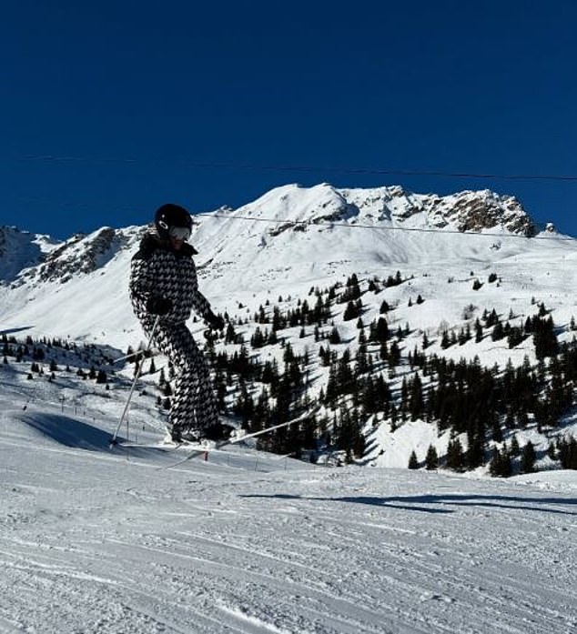 In another photo, Roxy was seen wearing a houndstooth ski jacket from Perfect Moment worth about $795 and matching pants worth about $895